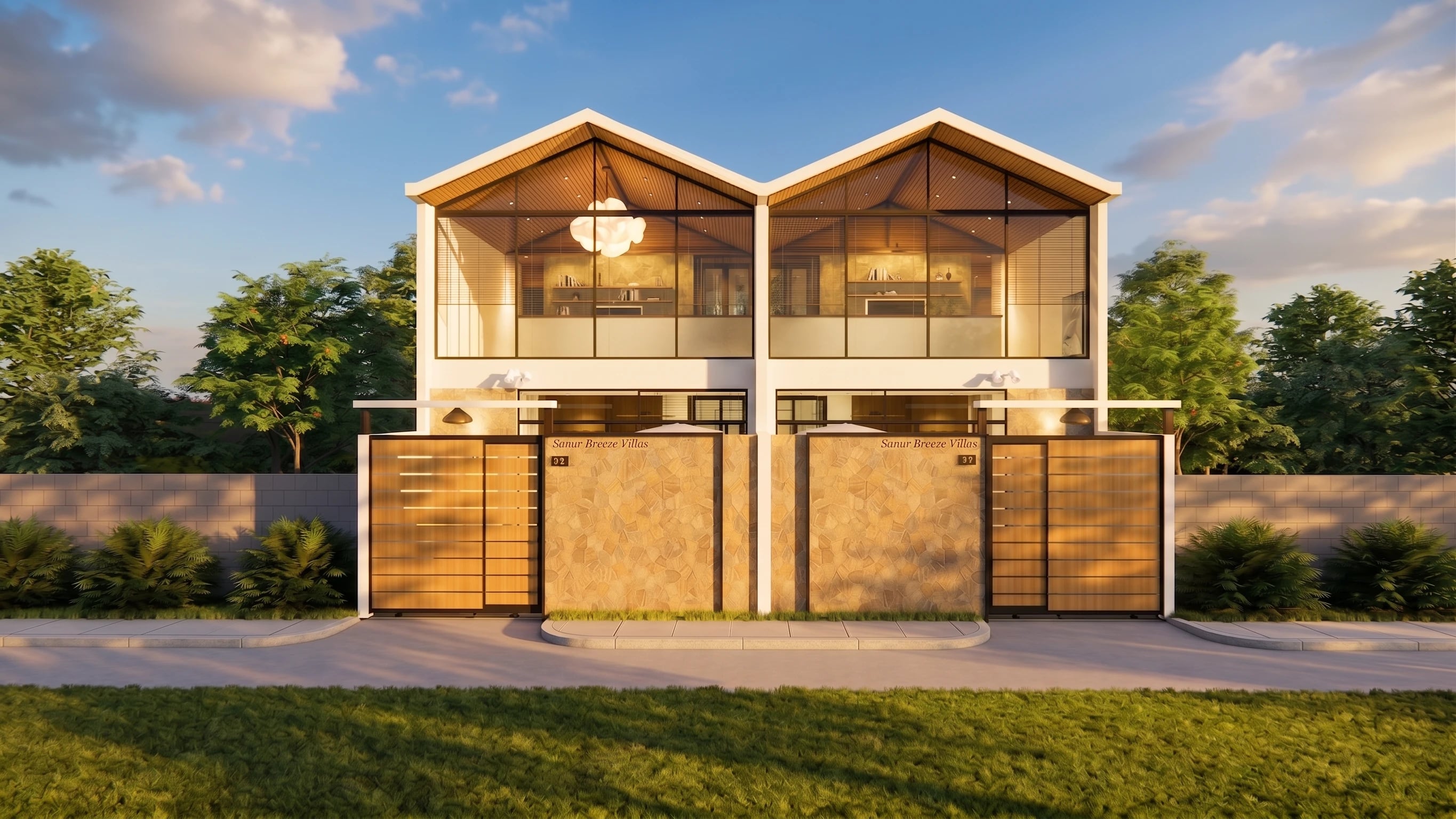 Sanur Breeze Villas V in late afternoon light — two double-height villas with pitched roofs and full-height glazing